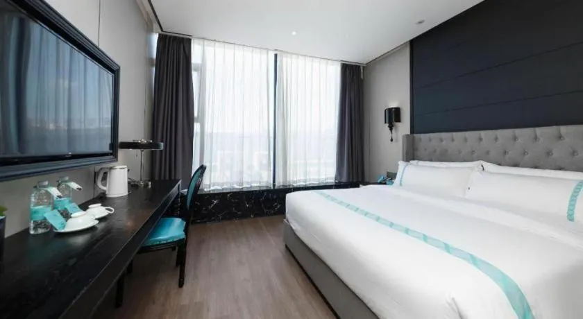 Bed in Xana Hotelle Luzhou High-Speed Railway Station Trading Market Passenger Terminal