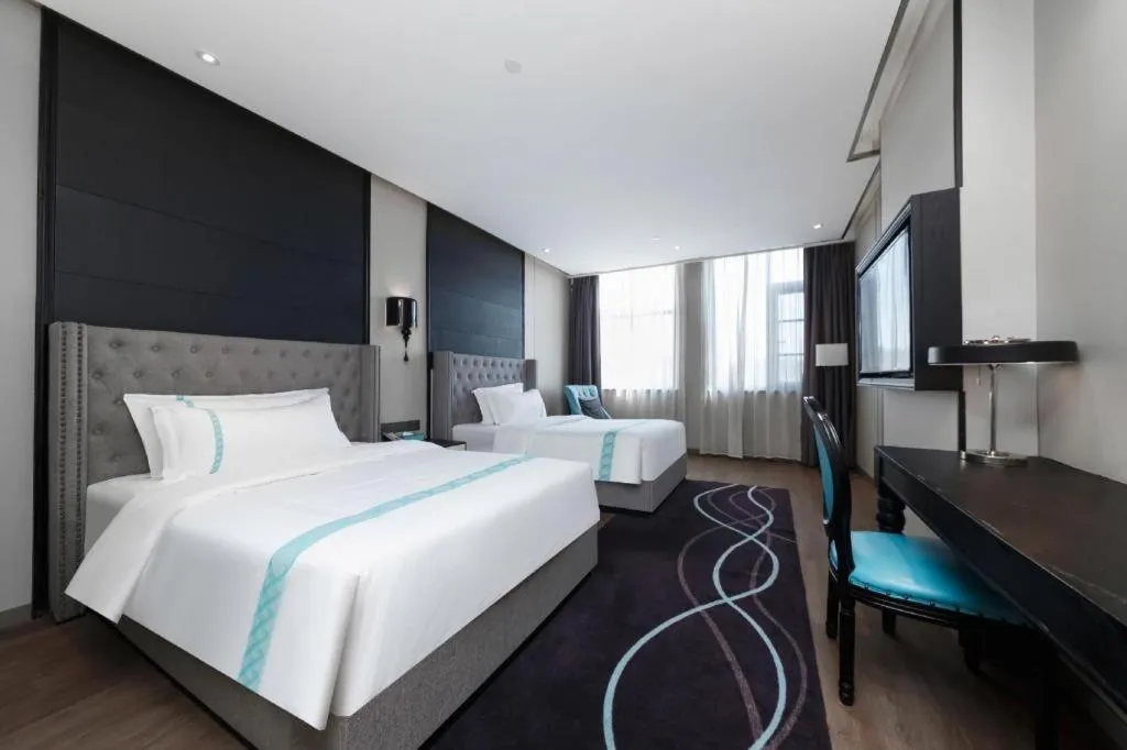 Bed in Xana Hotelle Luzhou High-Speed Railway Station Trading Market Passenger Terminal