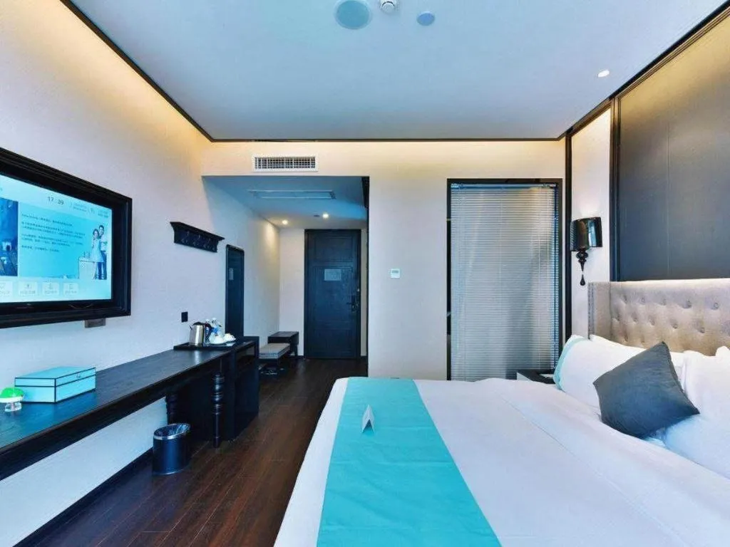 Bed in Xana Hotelle Luzhou High-Speed Railway Station Trading Market Passenger Terminal