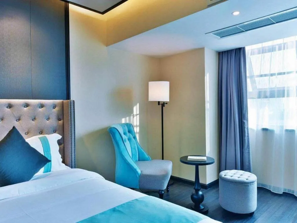 Bed in Xana Hotelle Luzhou High-Speed Railway Station Trading Market Passenger Terminal