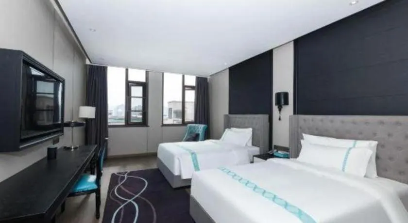 Bed in Xana Hotelle Luzhou High-Speed Railway Station Trading Market Passenger Terminal