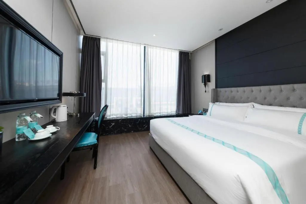 Bed in Xana Hotelle Luzhou High-Speed Railway Station Trading Market Passenger Terminal