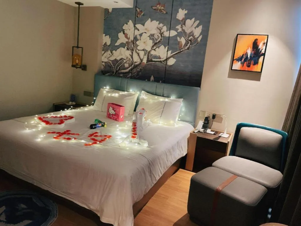 Bed in Magnotel Tongxiang Shimao Center