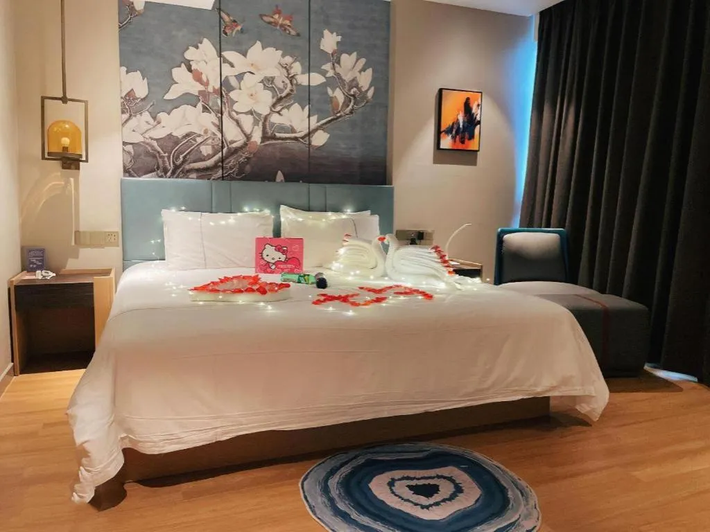Bed in Magnotel Tongxiang Shimao Center