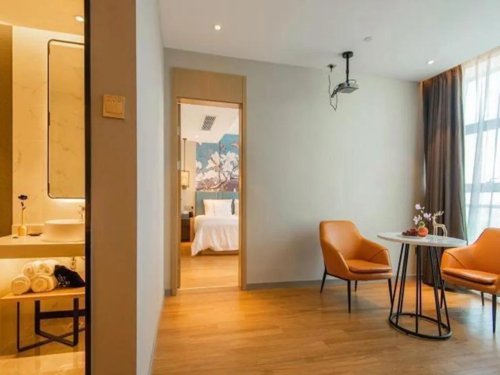 Bed in Magnotel Tongxiang Shimao Center