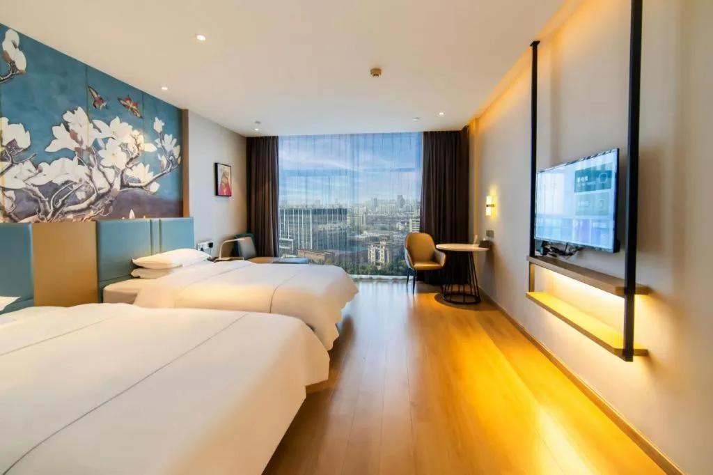 Bed in Magnotel Tongxiang Shimao Center