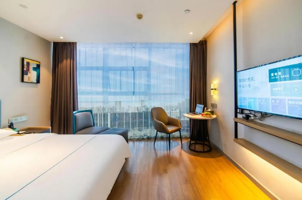 Bed in Magnotel Tongxiang Shimao Center