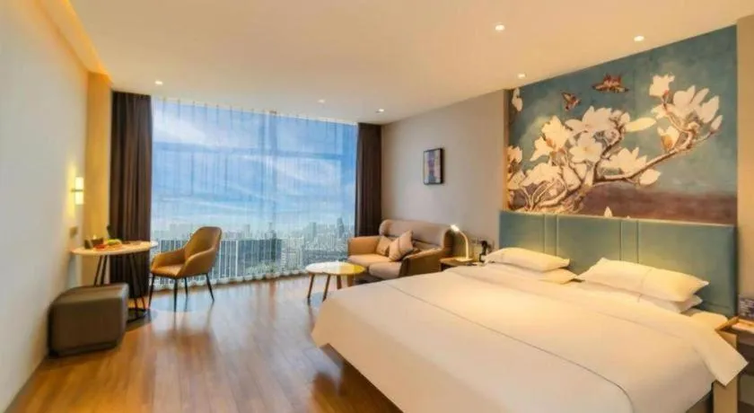 Bed in Magnotel Tongxiang Shimao Center