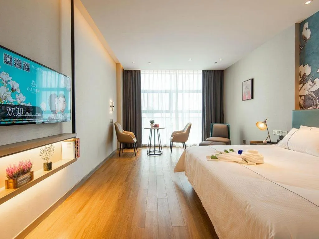 Bed in Magnotel Tongxiang Shimao Center