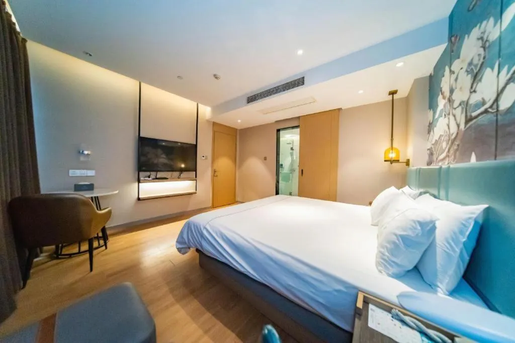 Bed in Magnotel Tongxiang Shimao Center