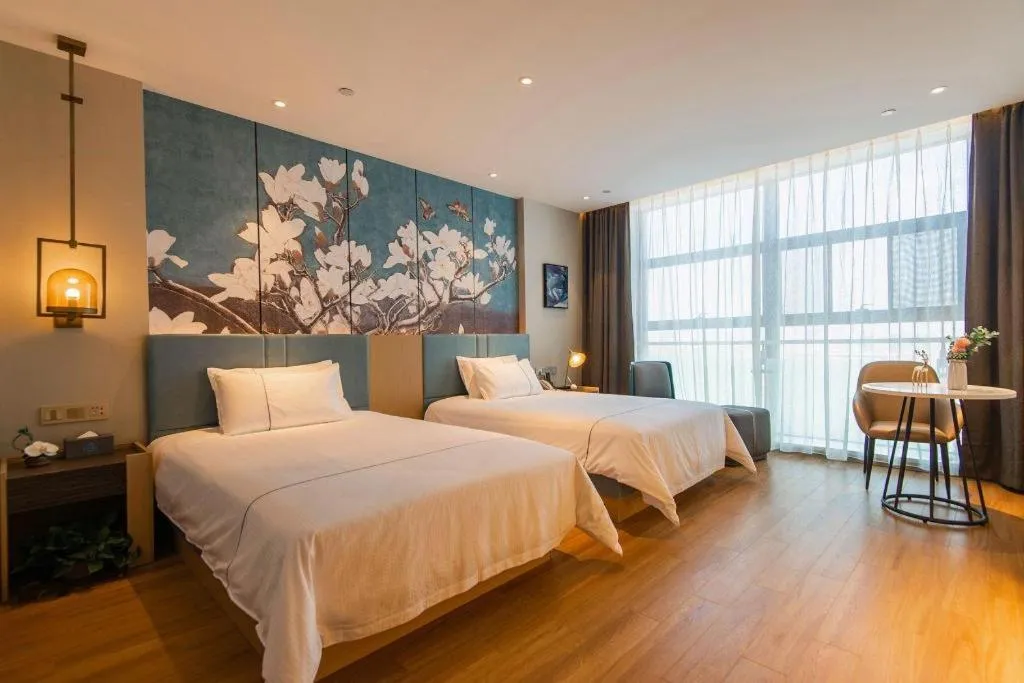 Bed in Magnotel Tongxiang Shimao Center