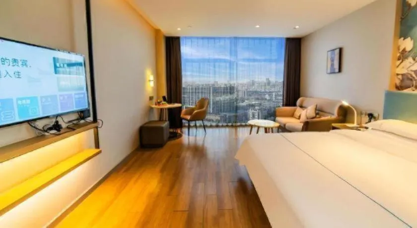 Bed in Magnotel Tongxiang Shimao Center