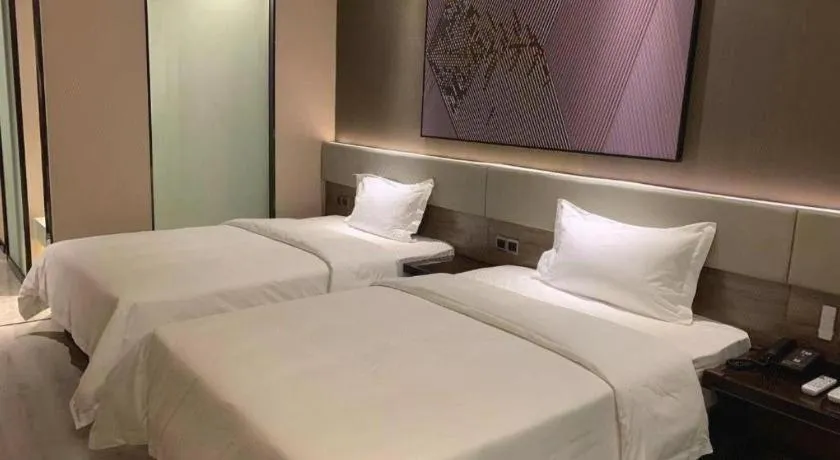 Bed in IU Hotels· Wuhan Jianghan Road Metro Station