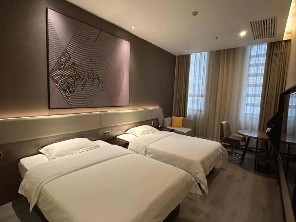 Bed in IU Hotels· Wuhan Jianghan Road Metro Station