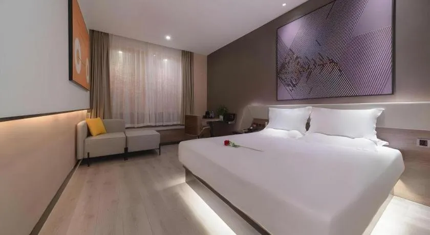 Bed in IU Hotels· Wuhan Jianghan Road Metro Station