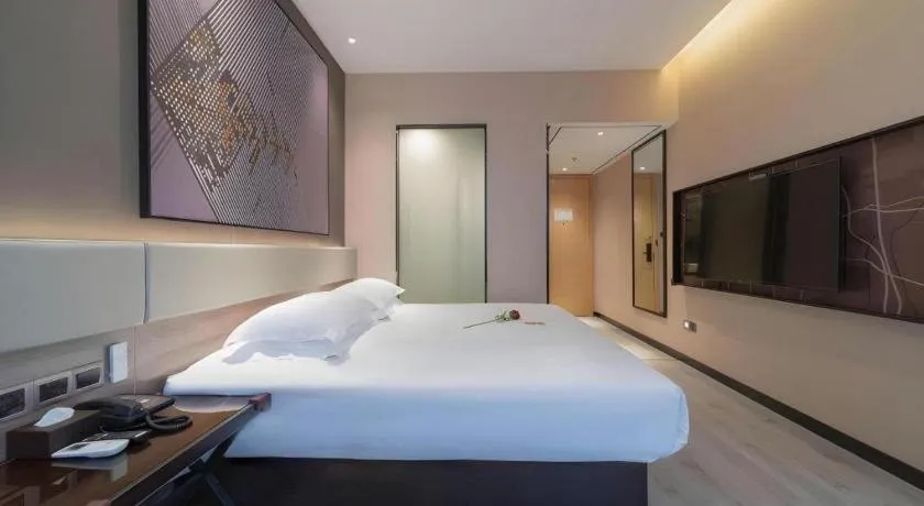 Bed in IU Hotels· Wuhan Jianghan Road Metro Station