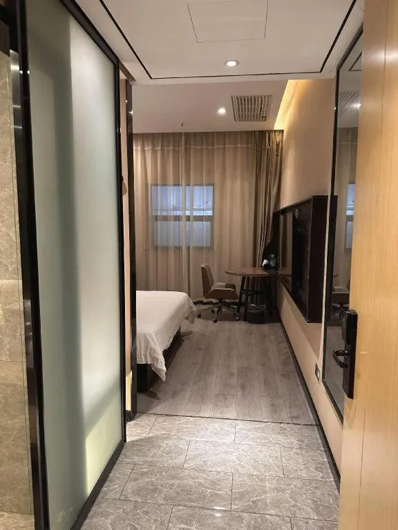 Bed in IU Hotels· Wuhan Jianghan Road Metro Station