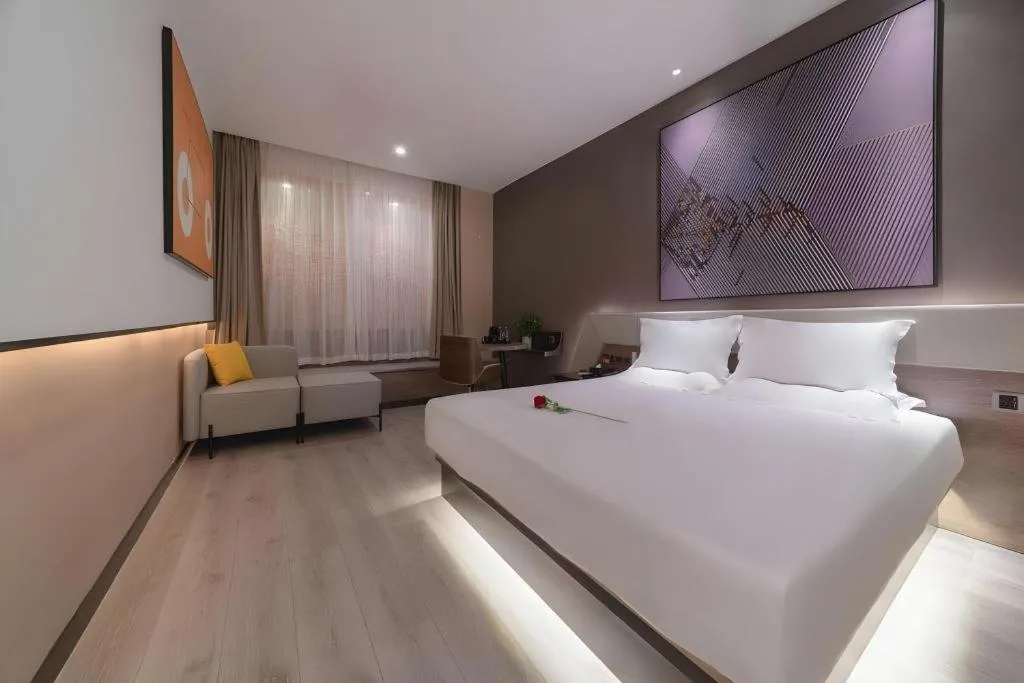 Bed in IU Hotels· Wuhan Jianghan Road Metro Station