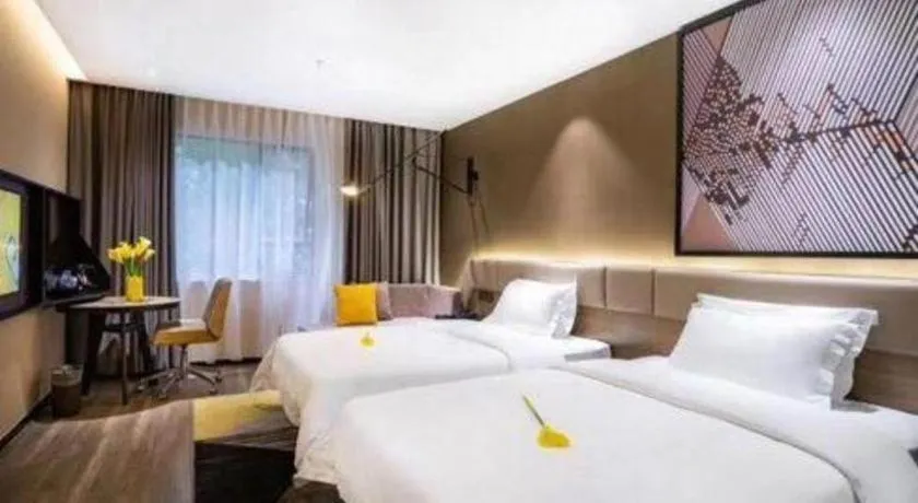 Bed in IU Hotels· Wuhan Jianghan Road Metro Station