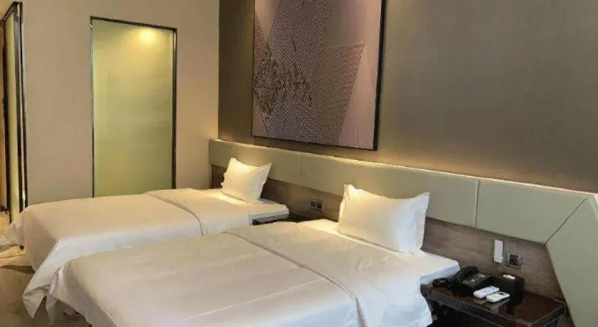 Bed in IU Hotels· Wuhan Jianghan Road Metro Station