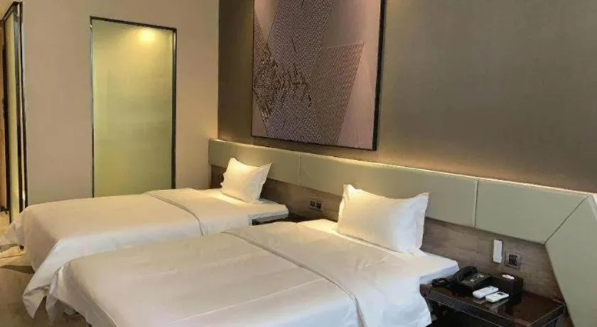 Bed in IU Hotels· Wuhan Jianghan Road Metro Station