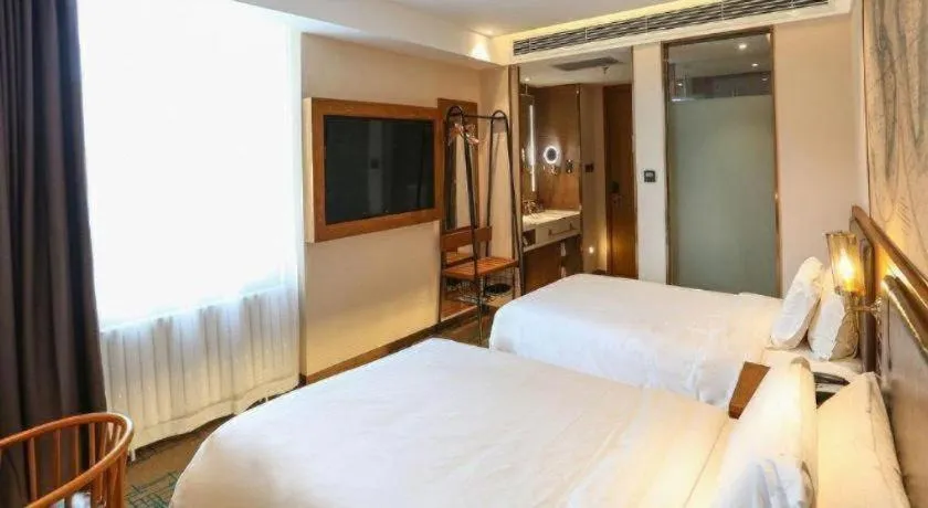 Bed in James Joyce Coffetel Changchun People's Square