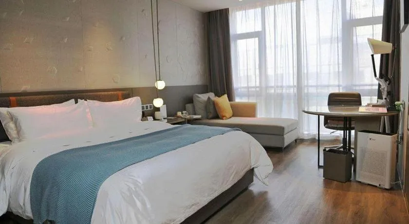 Bed in Zhejiang Cloud Mountain Deefly Hotel