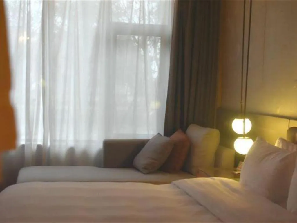 Bed in Zhejiang Cloud Mountain Deefly Hotel