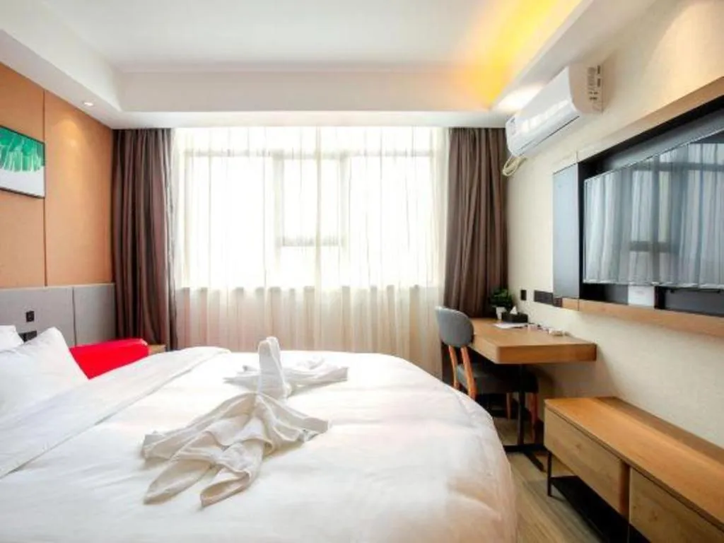 Bed in UP and IN Hotel Jiangxi Nanchang City Nanchang County Liantang Zhong Avenue Huarunwanjia