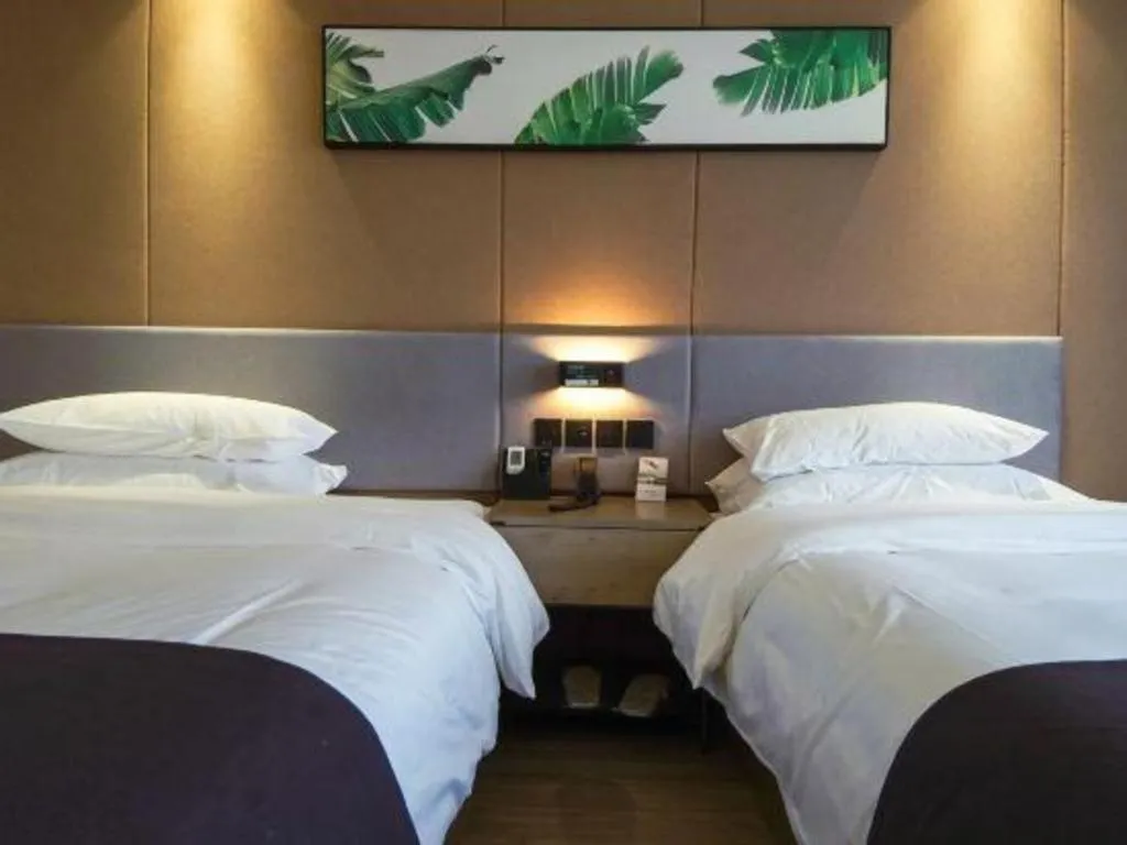 Bed in UP and IN Hotel Jiangxi Nanchang City Nanchang County Liantang Zhong Avenue Huarunwanjia