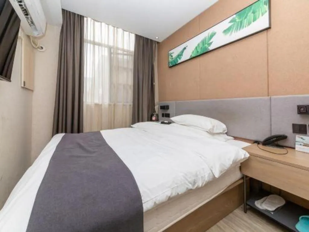 Bed in UP and IN Hotel Jiangxi Nanchang City Nanchang County Liantang Zhong Avenue Huarunwanjia