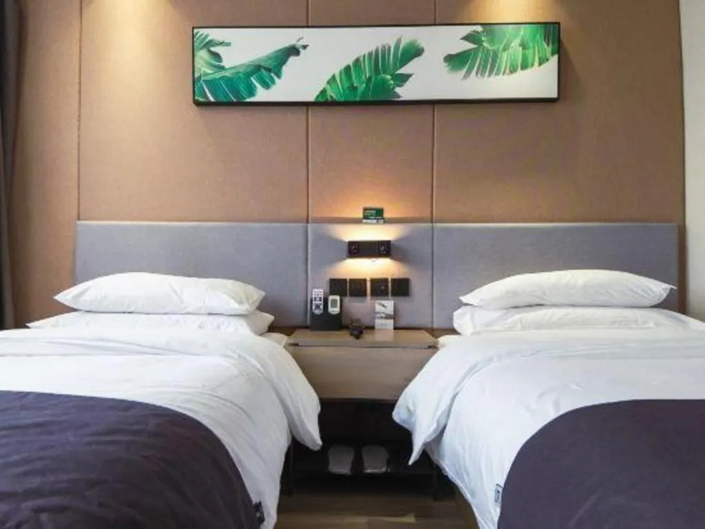 Bed in UP and IN Hotel Jiangxi Nanchang City Nanchang County Liantang Zhong Avenue Huarunwanjia