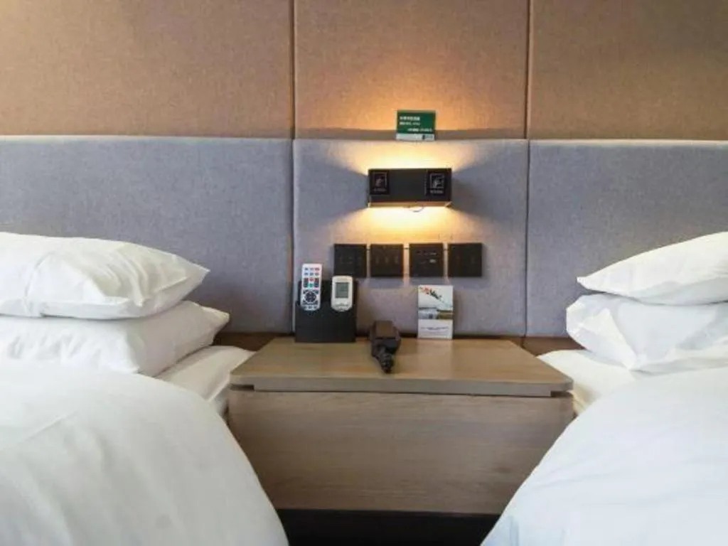 Bed in UP and IN Hotel Jiangxi Nanchang City Nanchang County Liantang Zhong Avenue Huarunwanjia