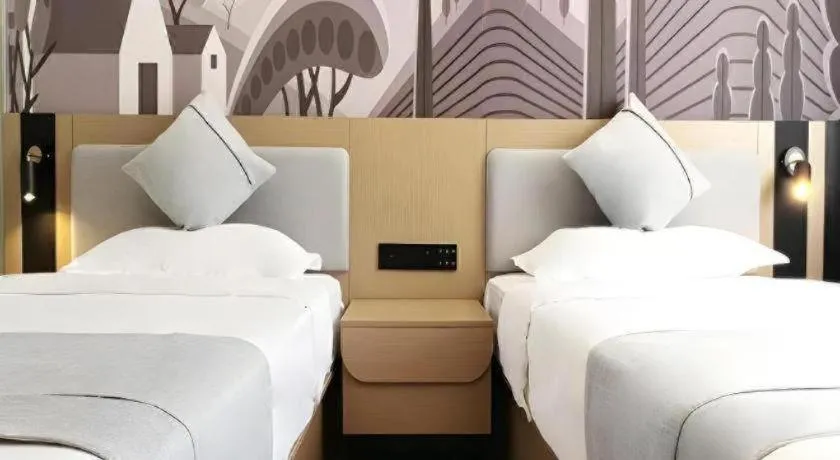 Bed in Thank Inn Hotel Hainan Sanya Sanya Bay Seascape Branch