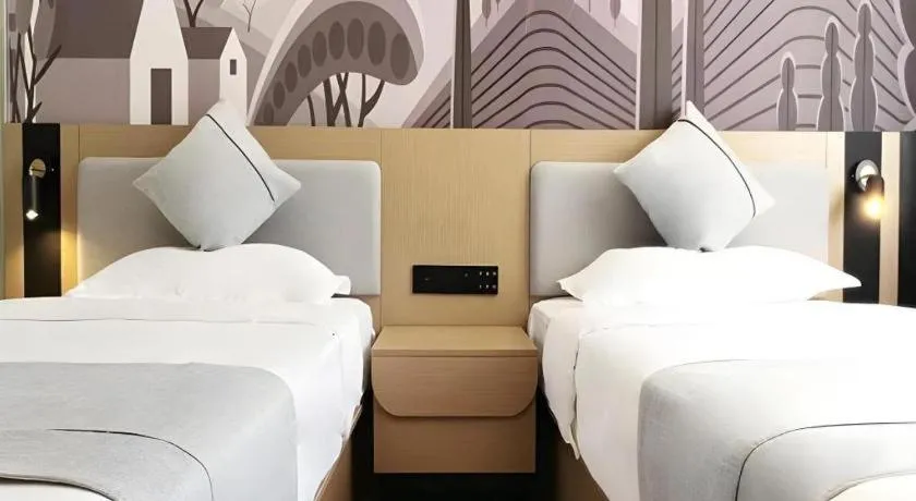 Bed in Thank Inn Hotel Hainan Sanya Sanya Bay Seascape Branch