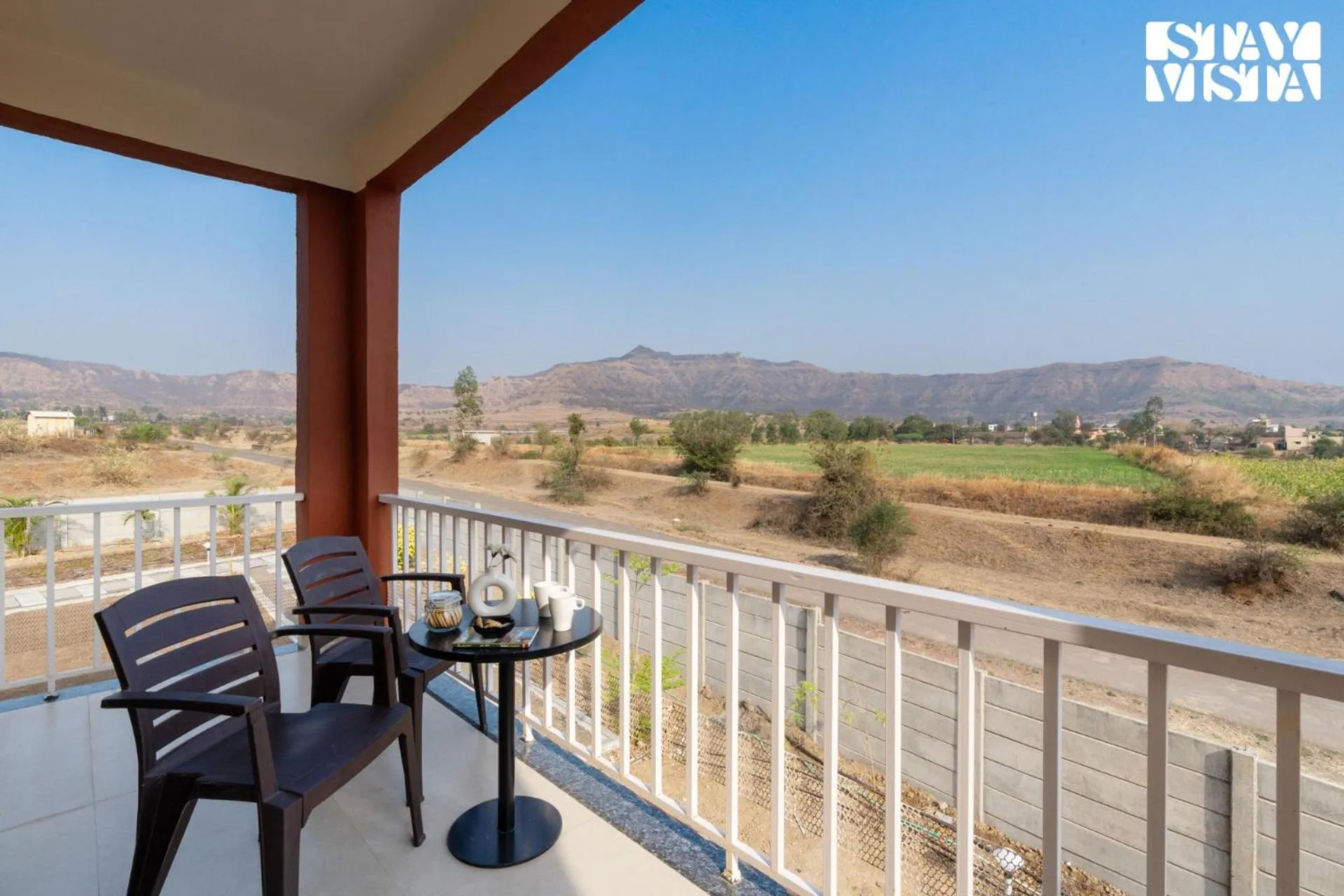 Balcony/Terrace in StayVista at Mangifera Agro Estate with Pool, Wi-Fi
