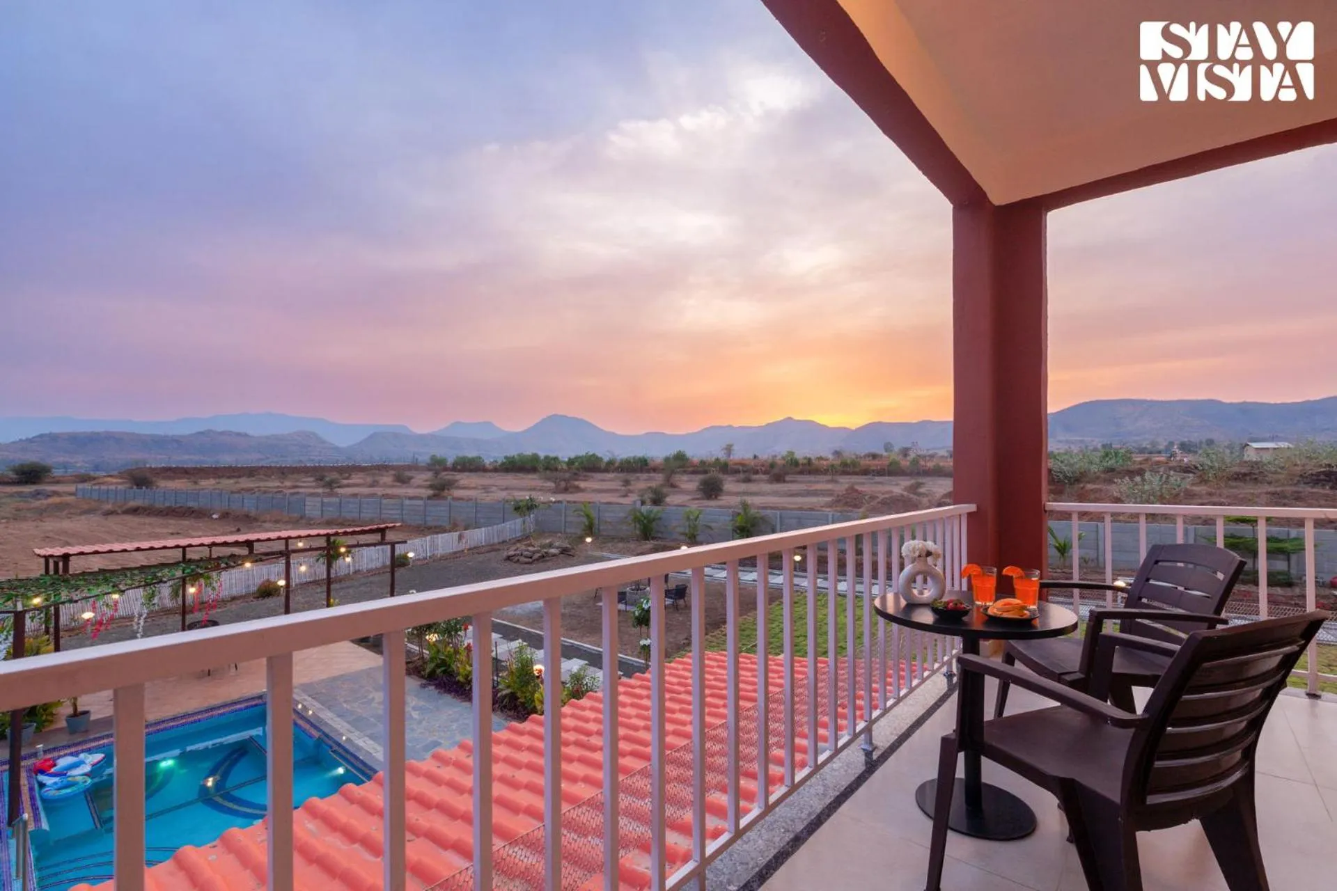 Balcony/Terrace in StayVista at Mangifera Agro Estate with Pool, Wi-Fi