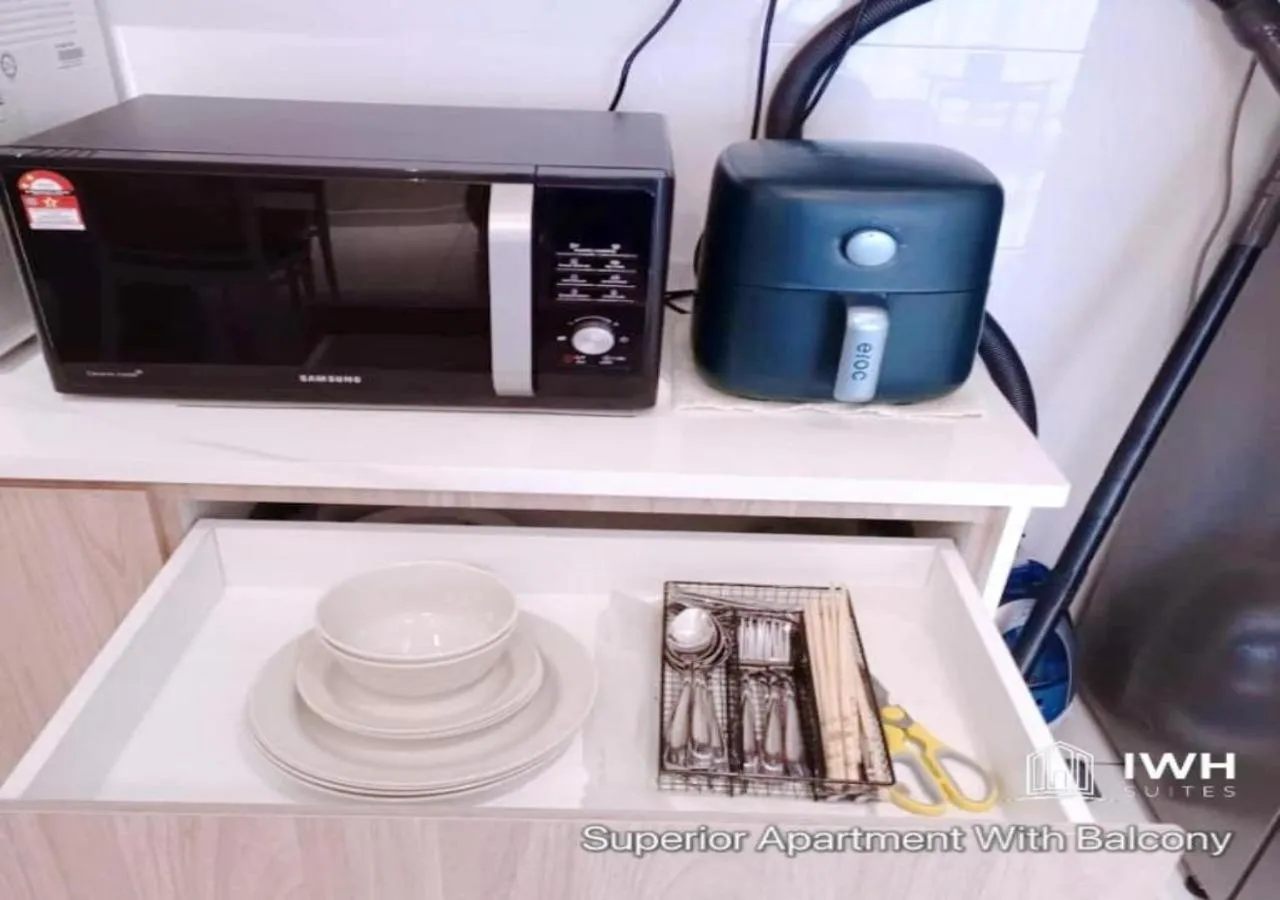 Kitchen or kitchenette in Ipoh Horizon Skypool Town Suites 4-11pax by IWH Suites