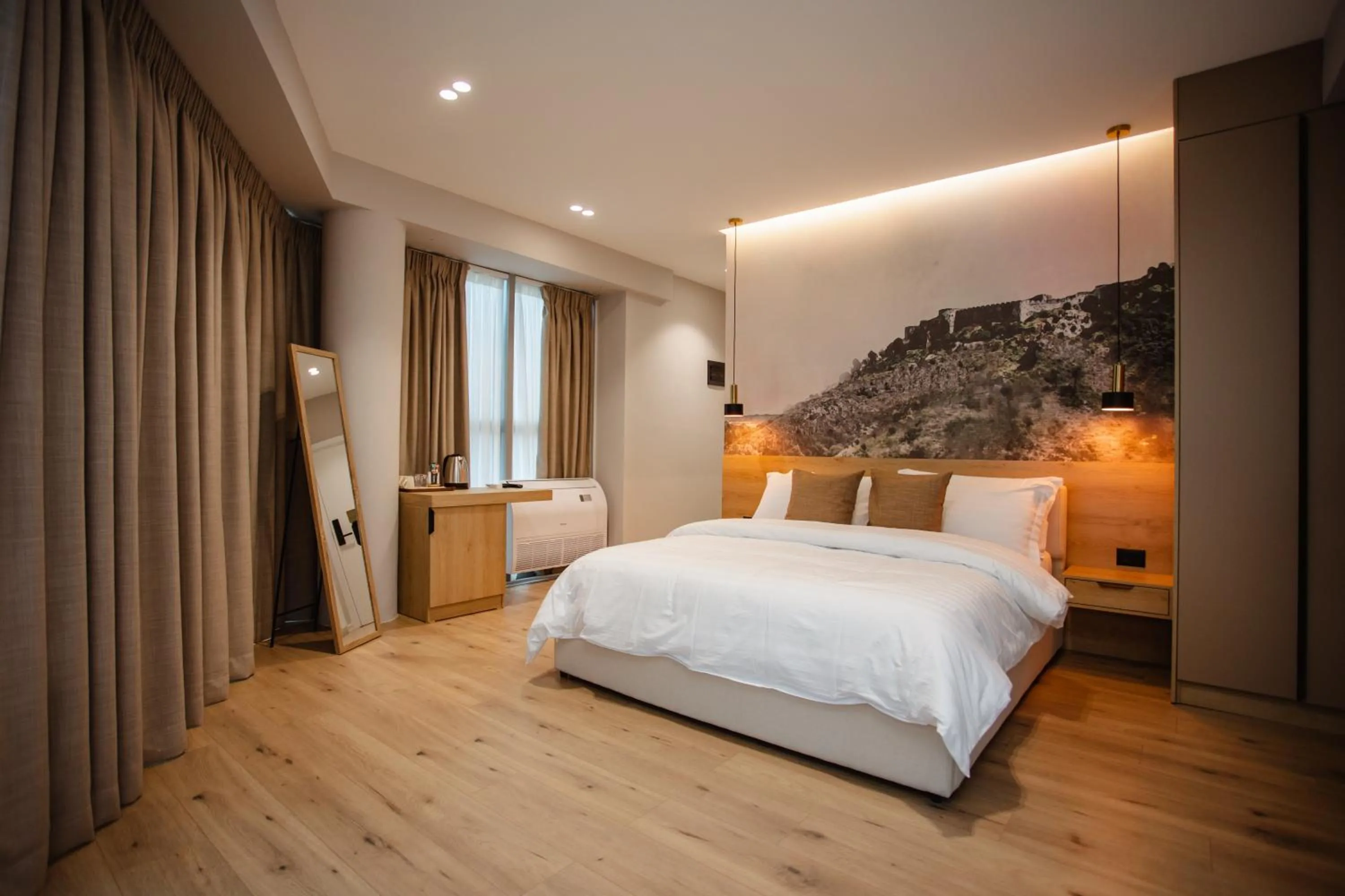 Bed in Oro Inn Hotel