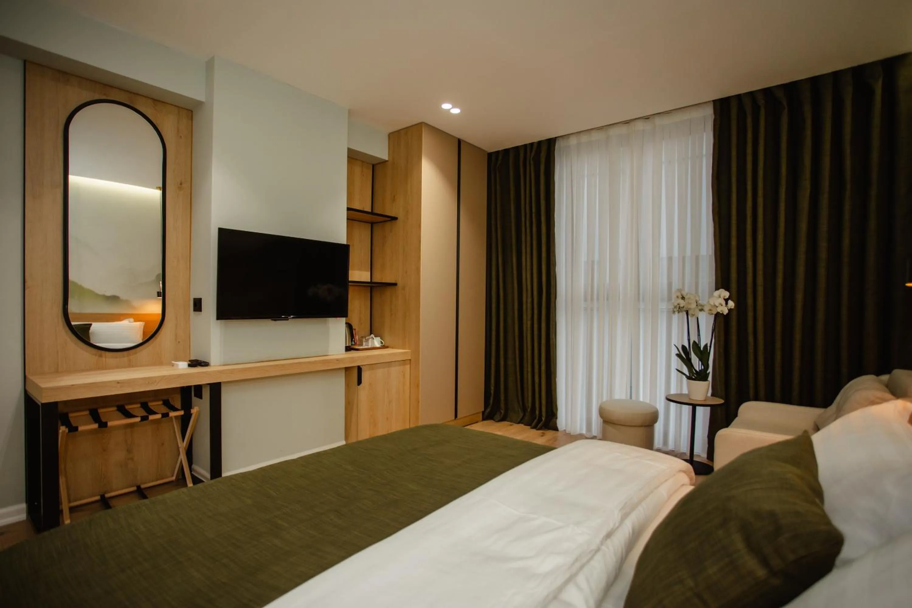 Bed in Oro Inn Hotel