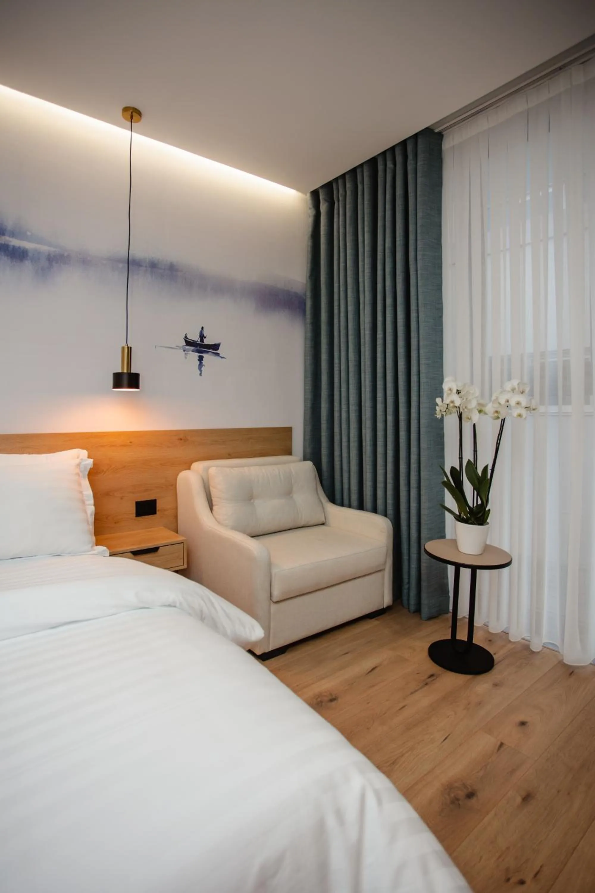 Bed in Oro Inn Hotel