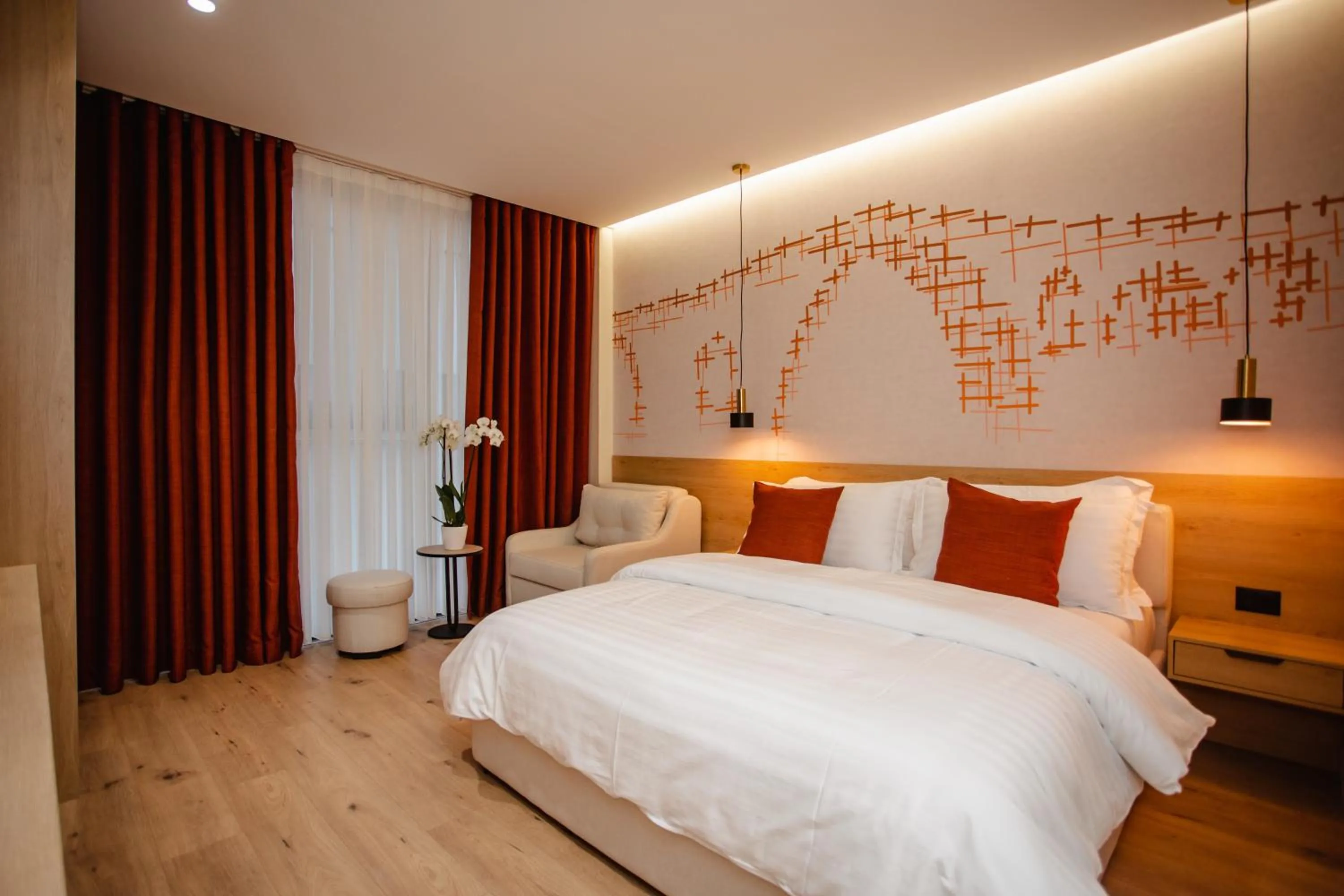 Bed in Oro Inn Hotel