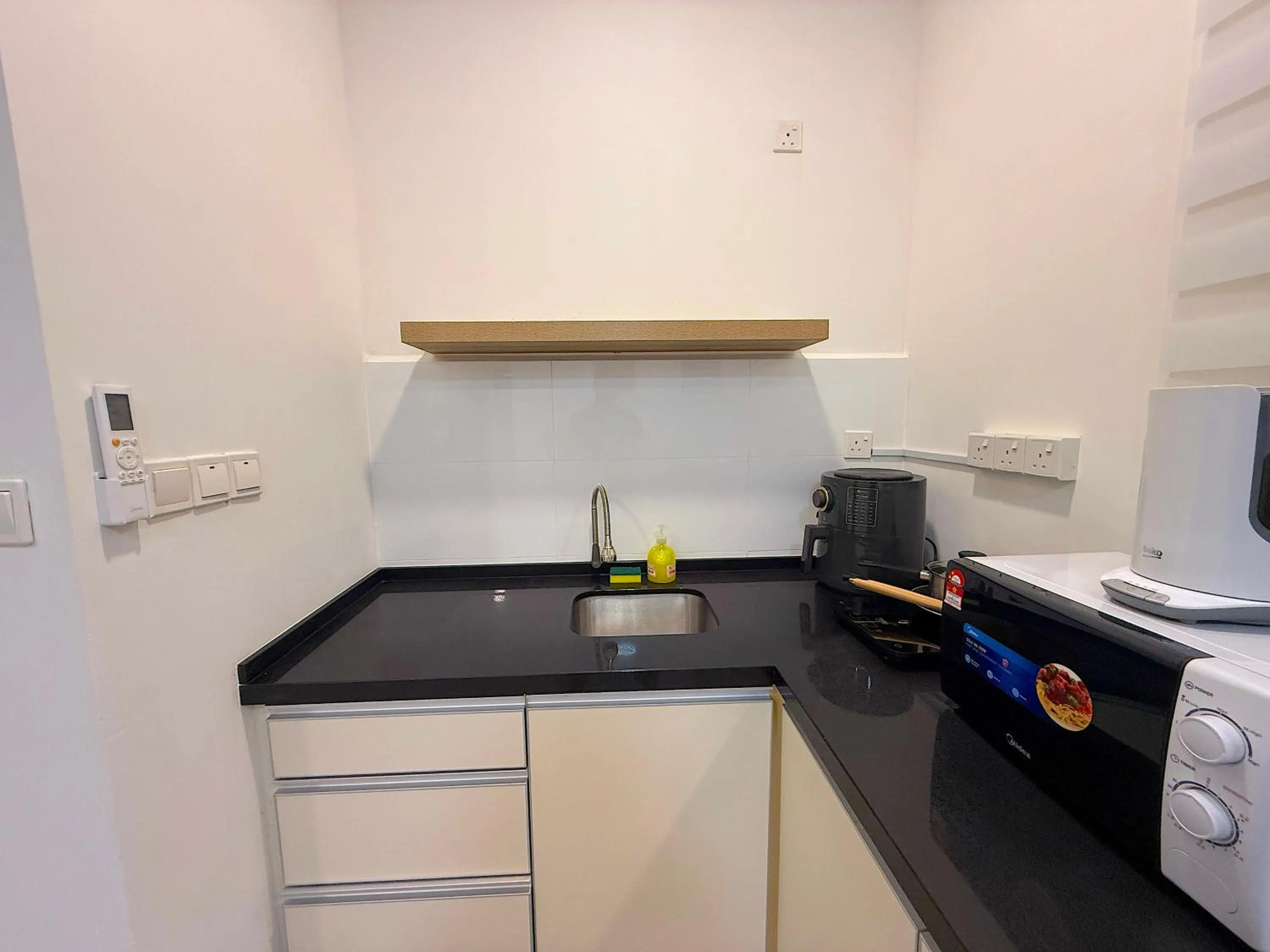 Kitchen or kitchenette in Neu Suites By Serenity Homes Near Gleneagles, KLCC & LRT