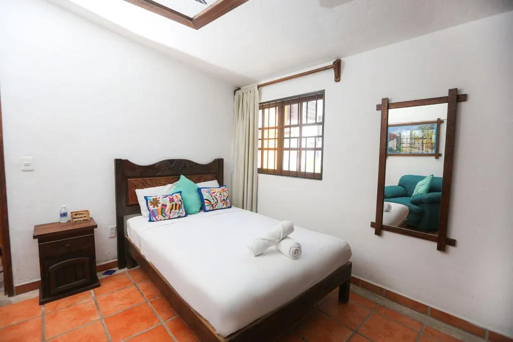 Bed in Íkaro Suites Colonial