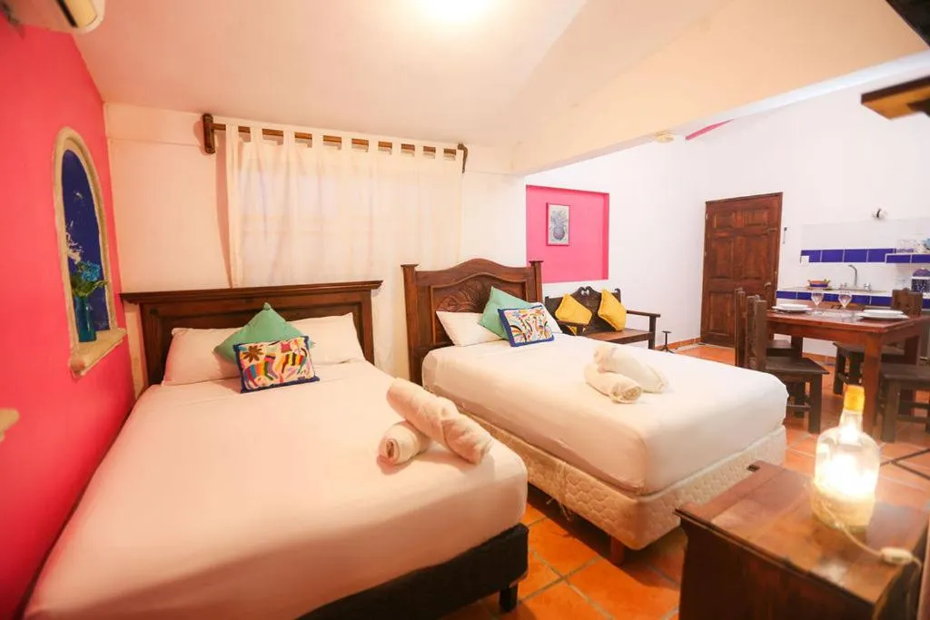 Bed in Íkaro Suites Colonial