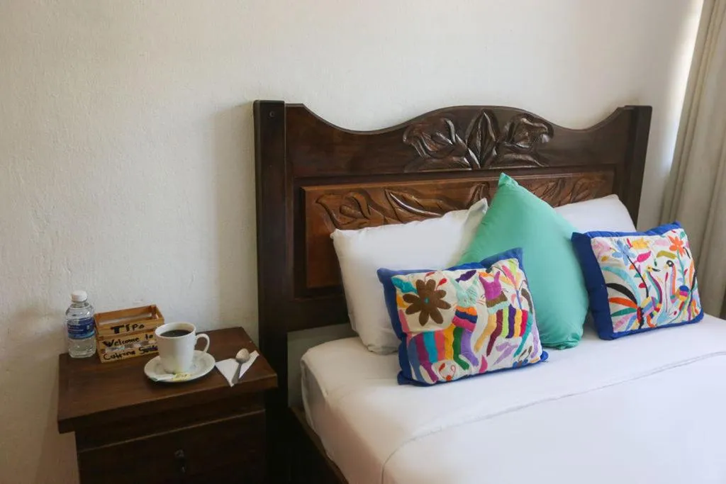 Bed in Íkaro Suites Colonial