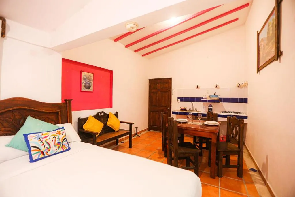 Bed in Íkaro Suites Colonial