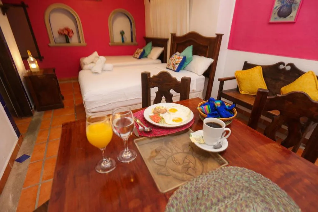 Bed in Íkaro Suites Colonial