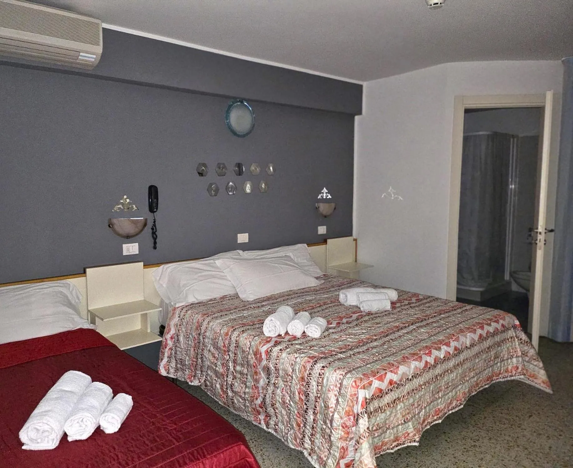 Bedroom in Hotel Villa Rosa