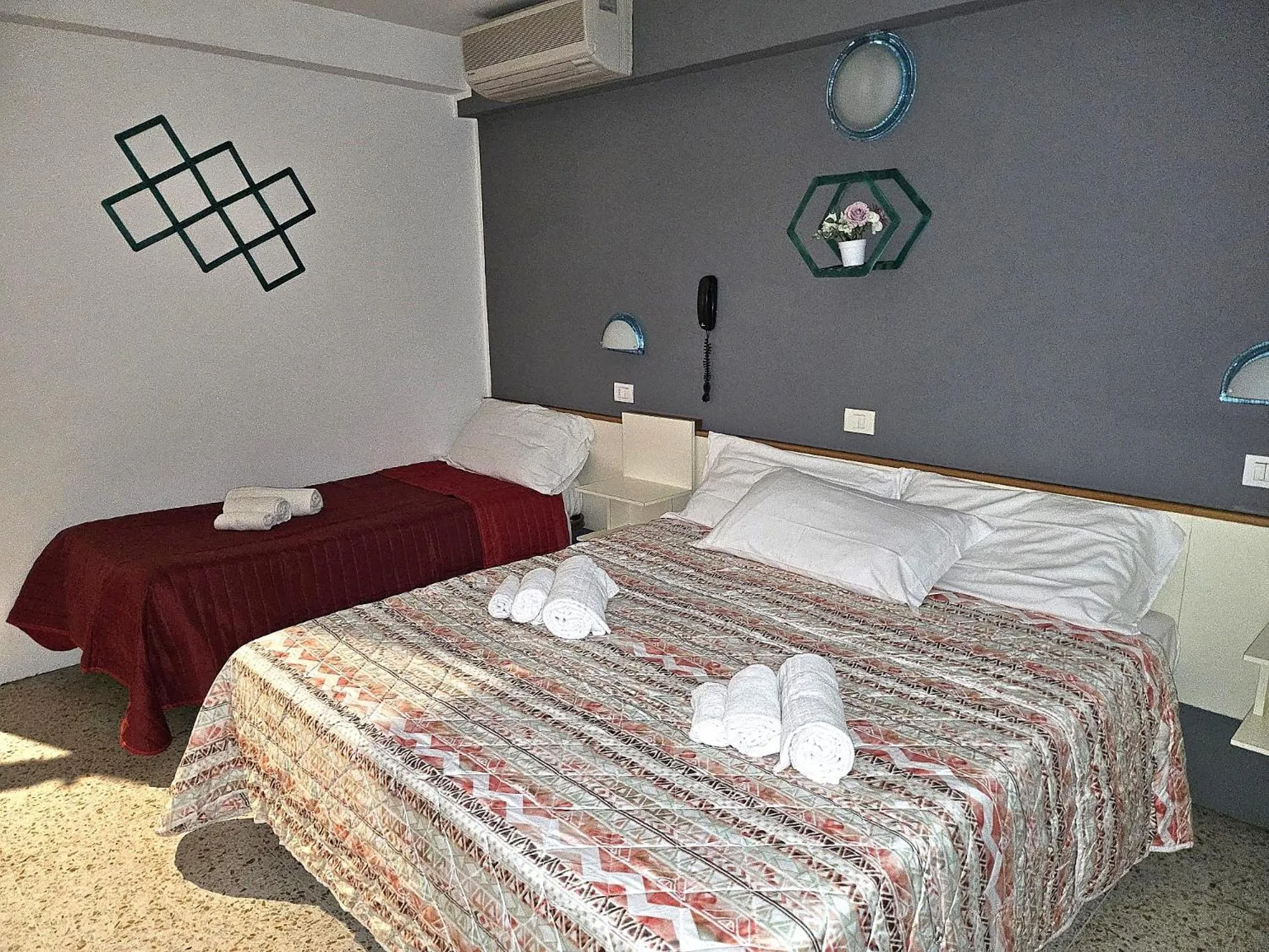 Bedroom in Hotel Villa Rosa